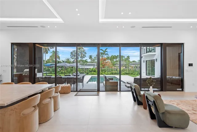 a view of outdoor kitchen and outdoor seating