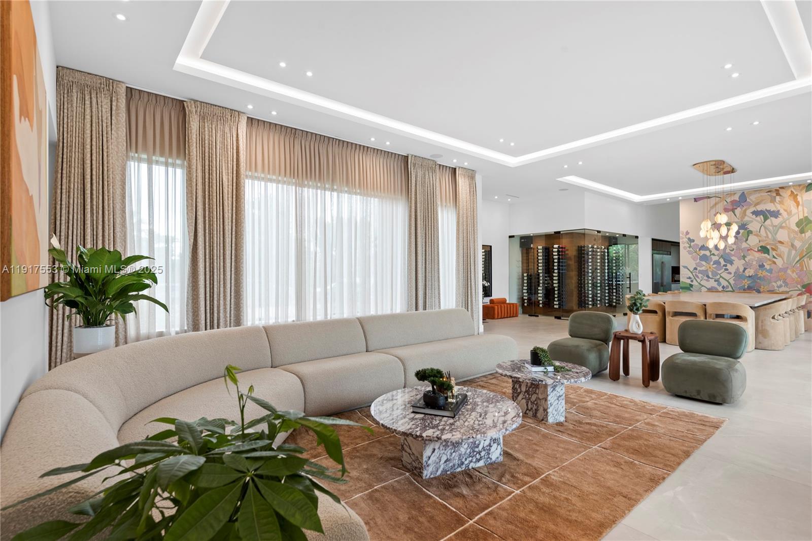 1881 Northeast 196th Terrace Miami, FL 33179 - Photo 16 of 98 a living room with furniture and a large window