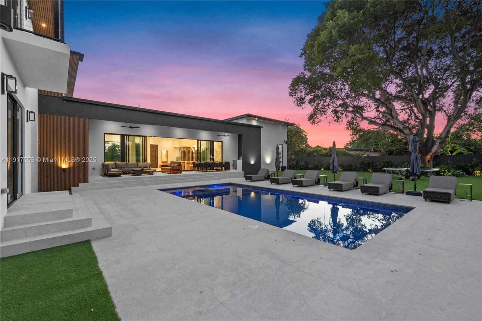 1881 Northeast 196th Terrace Miami, FL 33179 - Photo 44 of 98 a view of a house with swimming pool and sitting area