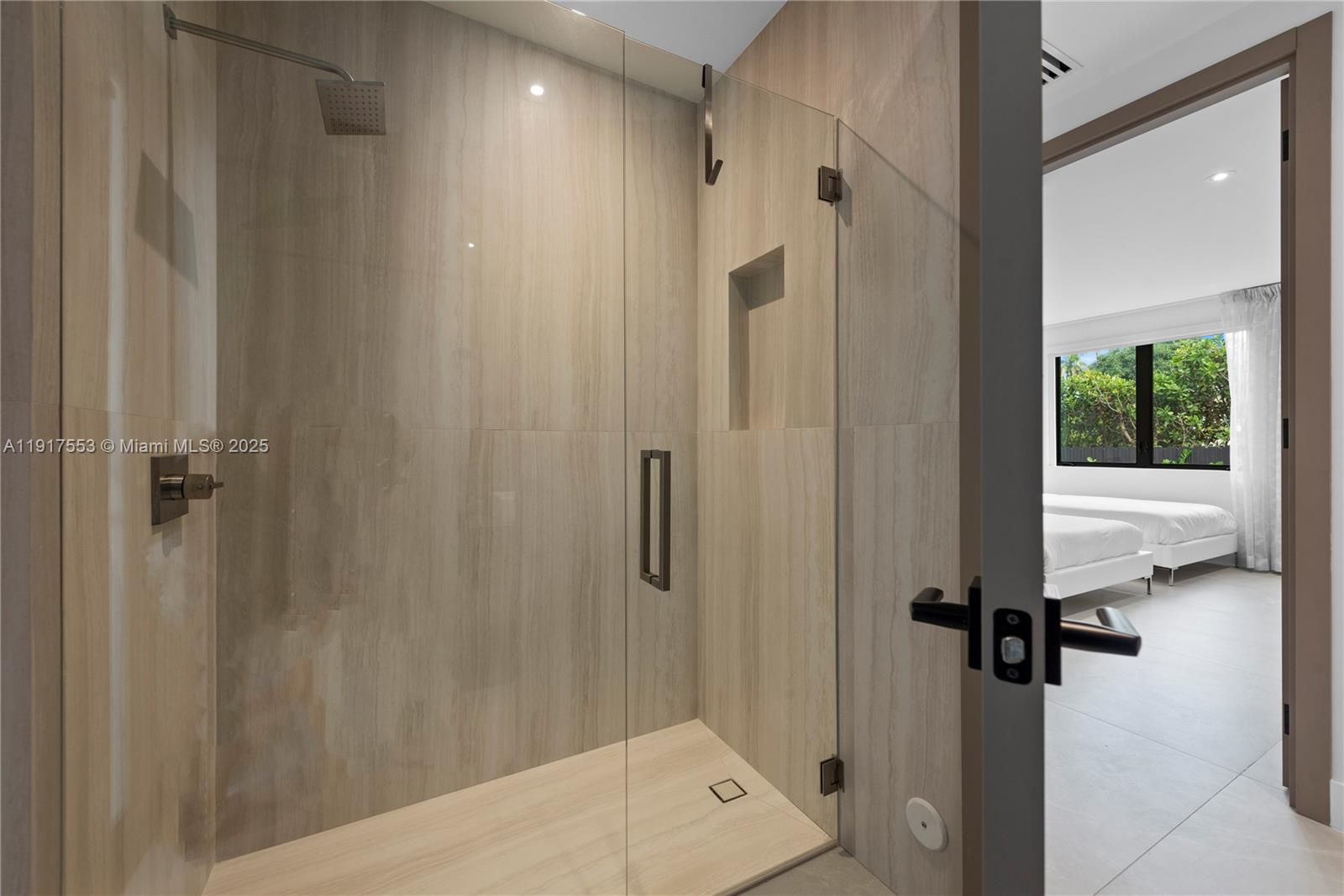 1881 Northeast 196th Terrace Miami, FL 33179 - Photo 98 of 98 a bathroom with a shower and a tub