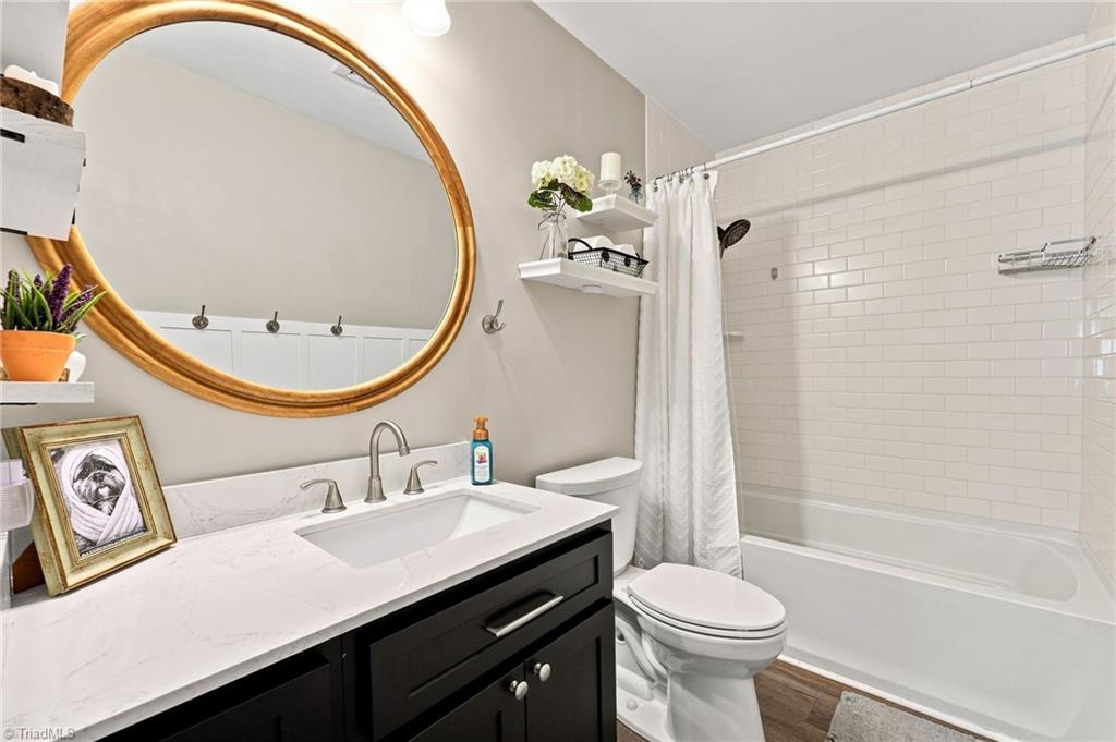 4843 Preacher Holmes Road Graham, NC 27253 - Photo 15 of 38 Circle mirror will be removed and replaced