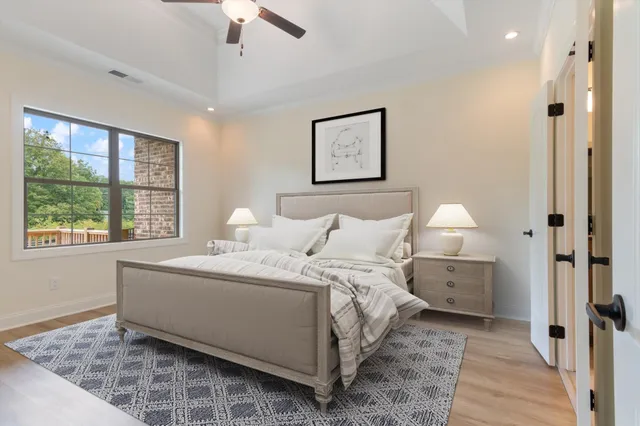 a bed room with a bed and a window