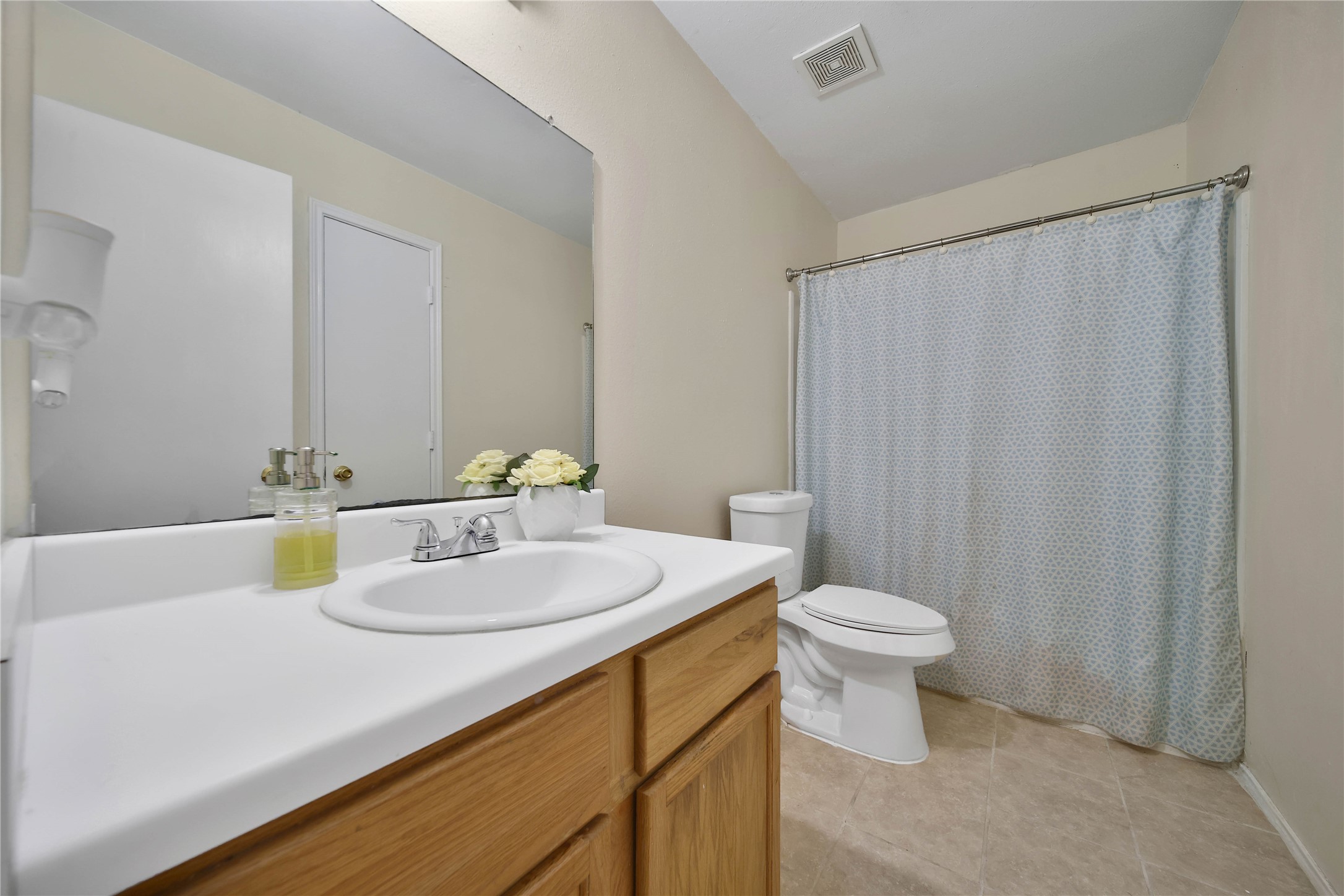 17323 Lobo Trail Houston, TX 77084 - Photo 16 of 21 a bathroom with a sink and a toilet