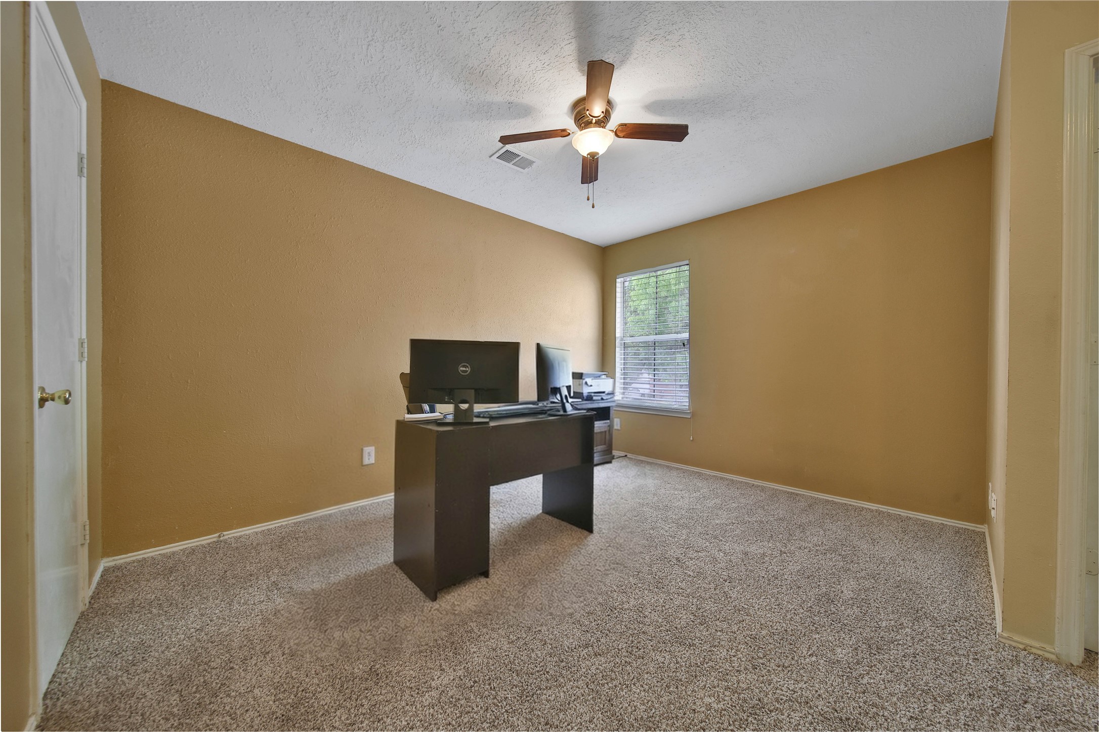 17323 Lobo Trail Houston, TX 77084 - Photo 17 of 21 a view of workspace with a window