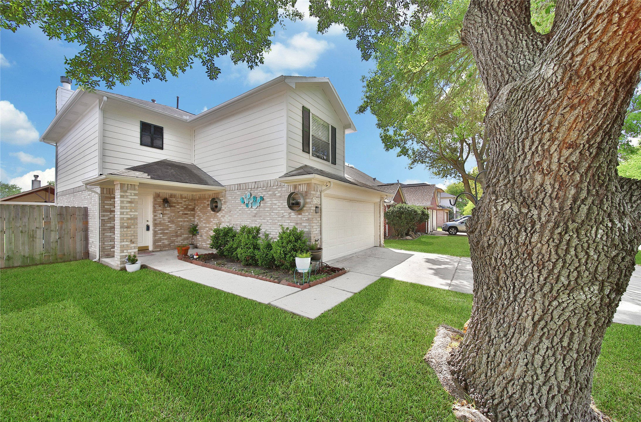 17323 Lobo Trail Houston, TX 77084 - Photo 2 of 21 a front view of a house with a yard