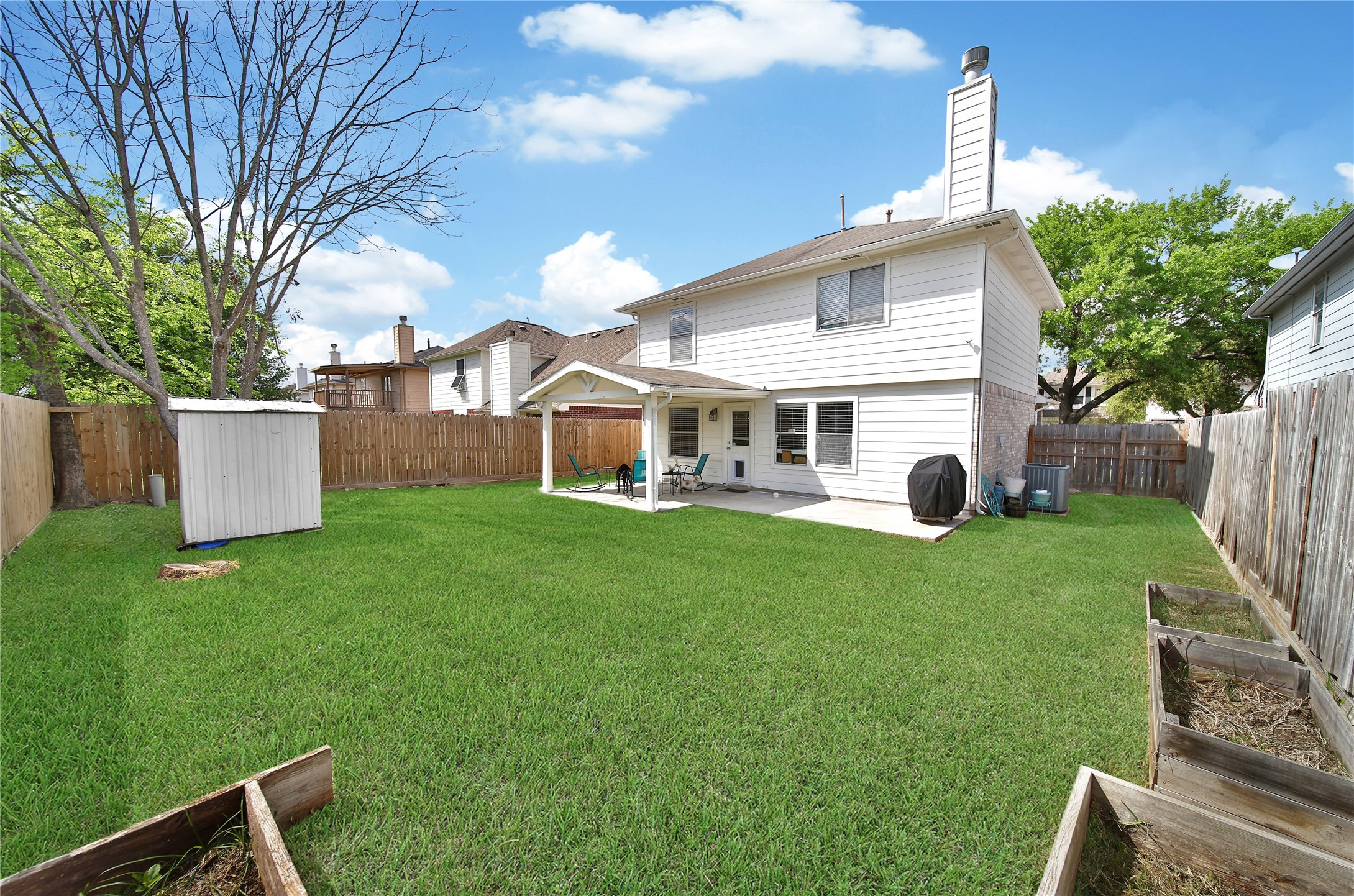 17323 Lobo Trail Houston, TX 77084 - Photo 21 of 21 a front view of a house with a yard