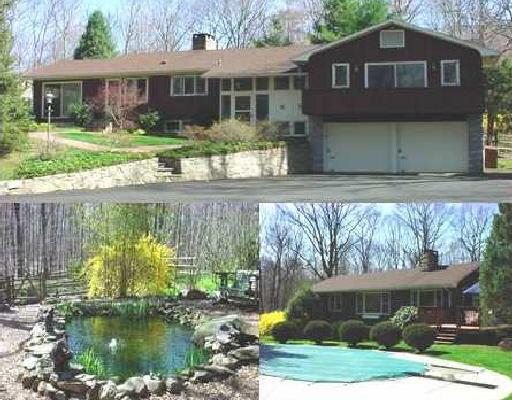 359 West Lane Ridgefield, CT 06877 - Photo 1 of 1 a front view of a house with a yard