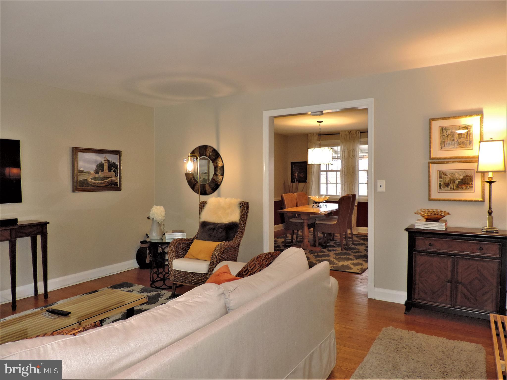 449 Whitfield Road Catonsville, MD 21228 - Photo 4 of 41 a living room with furniture a mirror and lamp
