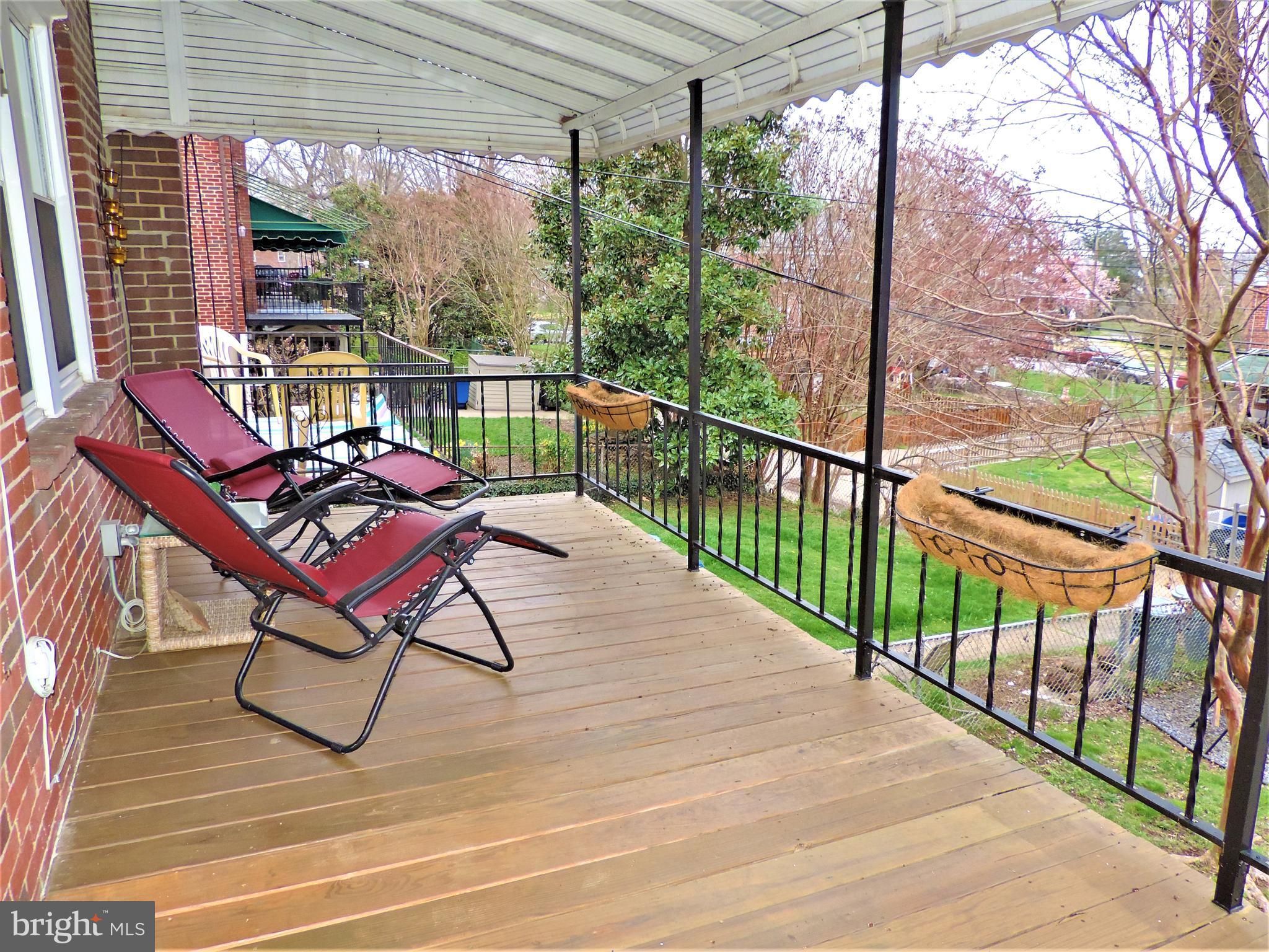 449 Whitfield Road Catonsville, MD 21228 - Photo 40 of 41 a view of a chairs on the deck