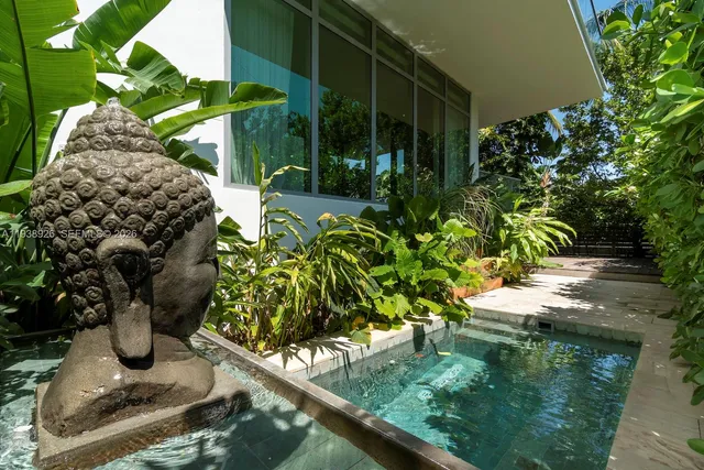 a backyard of a house with lots of green space