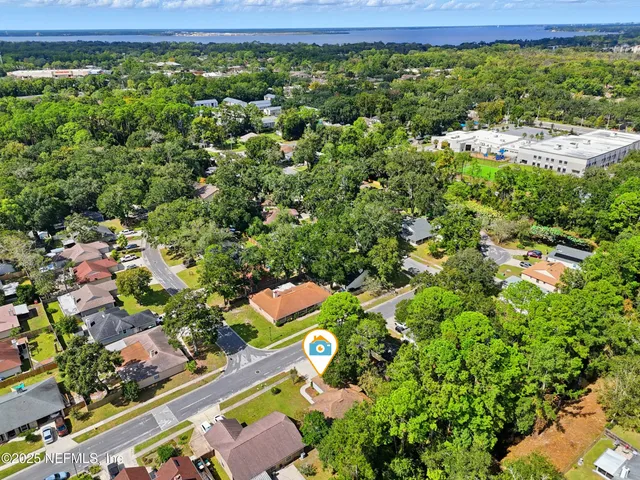 a view of a garden with an outdoor seating
