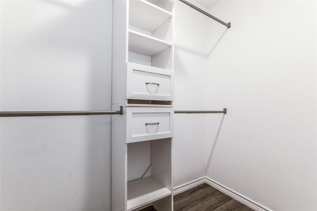 7659 Double Bridge Road Mabank, TX 75156 - Photo 18 of 22 Spacious closet with dark wood finished floors