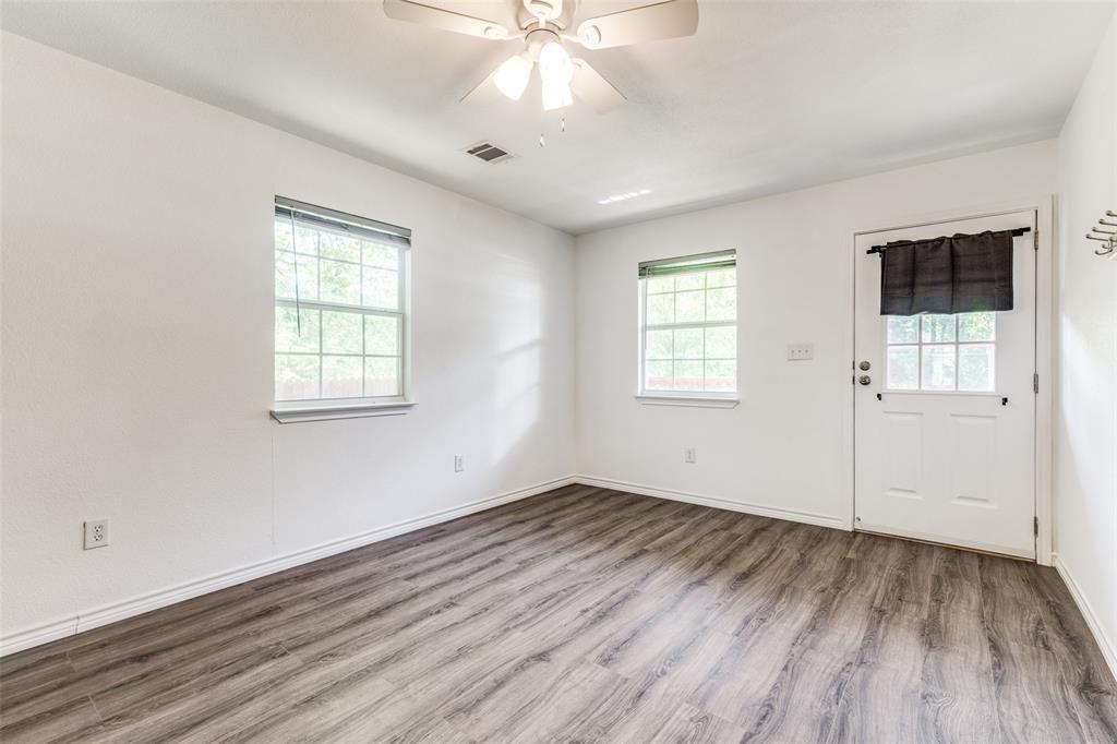 7659 Double Bridge Road Mabank, TX 75156 - Photo 9 of 22 Foyer entrance featuring wood finished floors and a ceiling fan