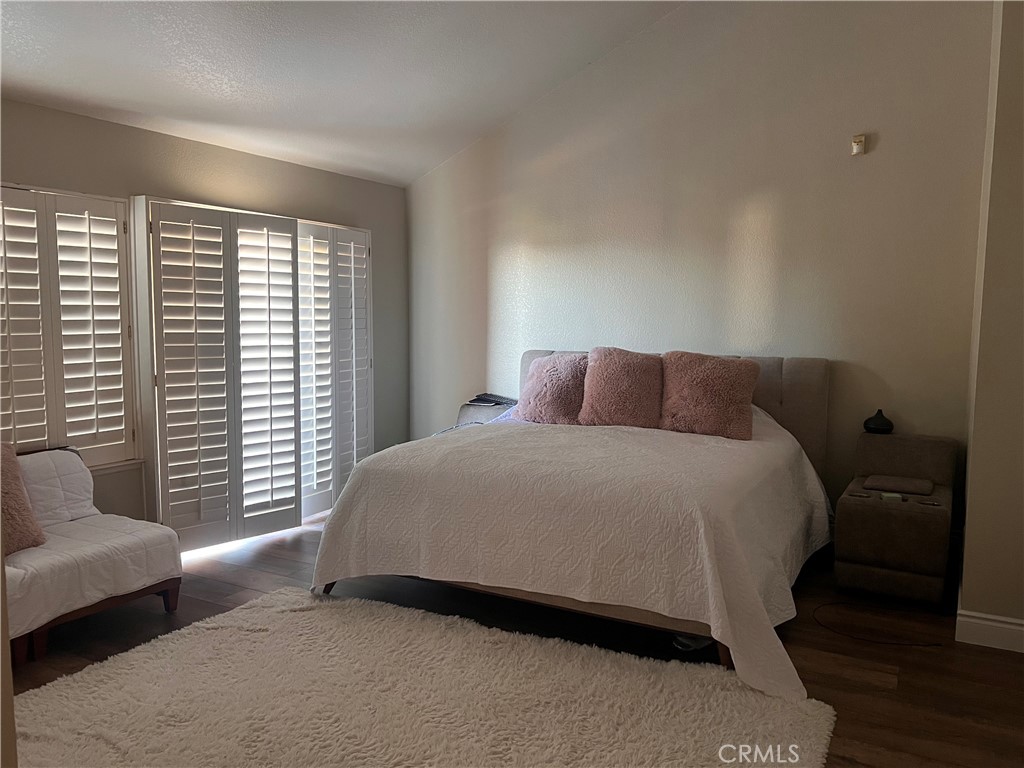 7158 Golden Vale Drive Riverside, CA 92506 - Photo 18 of 36 a bedroom with a bed and a couch