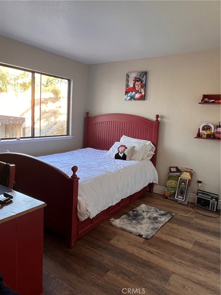 7158 Golden Vale Drive Riverside, CA 92506 - Photo 23 of 36 a bedroom with a bed and a window