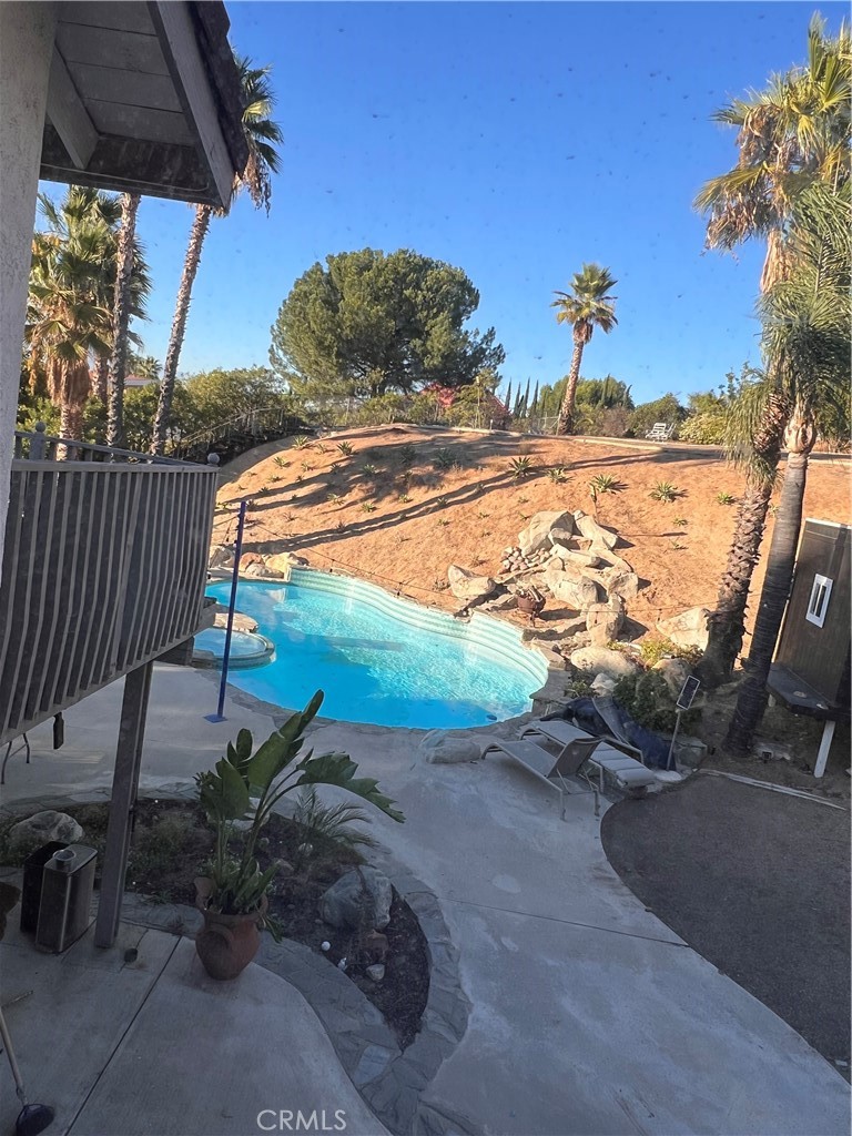 7158 Golden Vale Drive Riverside, CA 92506 - Photo 25 of 36 a view of a backyard with plants and a patio