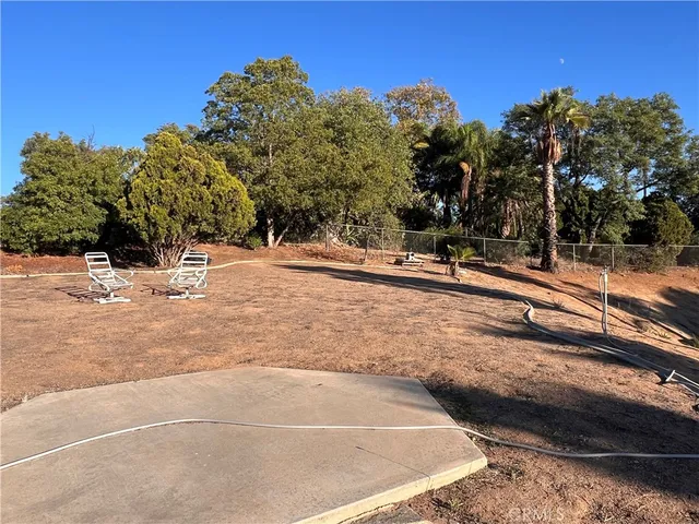 a view of a street with cars
