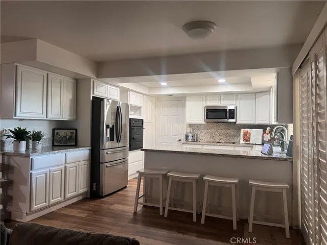 a view of a backyard of a house