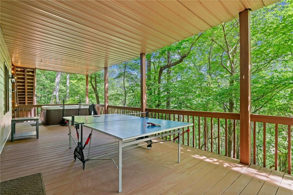 816 Alpine Drive Jasper, GA 30143 - Photo 20 of 51 a balcony with furniture and wooden floor