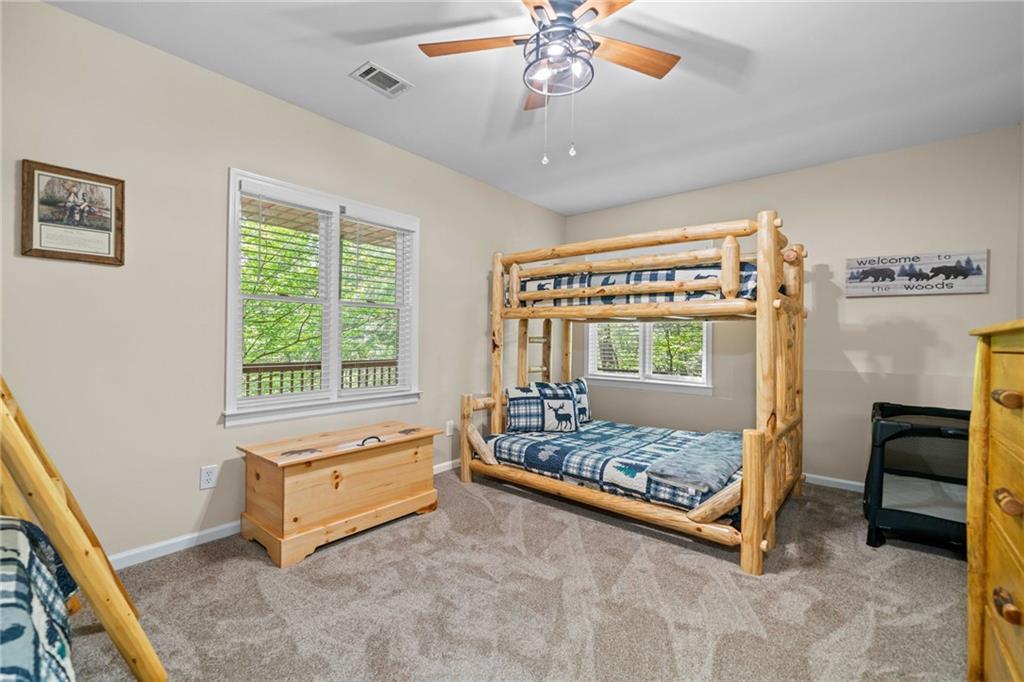 816 Alpine Drive Jasper, GA 30143 - Photo 26 of 51 a bedroom with a bed and a window
