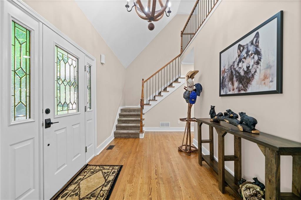 816 Alpine Drive Jasper, GA 30143 - Photo 31 of 51 a view of a hallway with windows and furniture