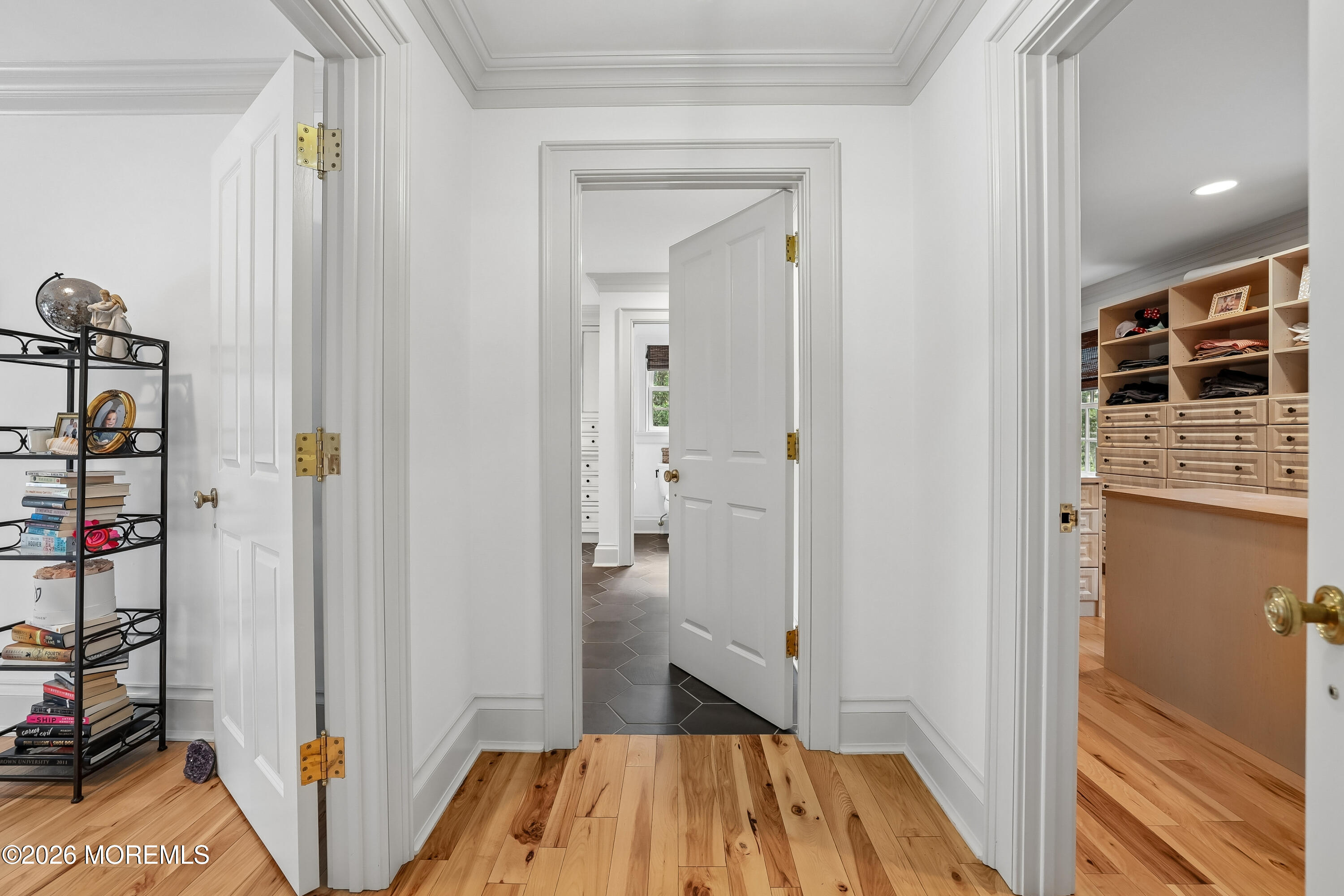 92 Tulip Lane Colts Neck, NJ 07722 - Photo 20 of 55 a view of a hallway with wooden floor and closet