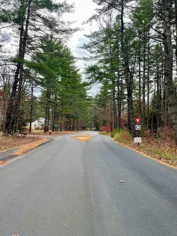 a view of road with trees