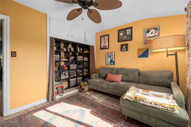 a living room with furniture and a rug