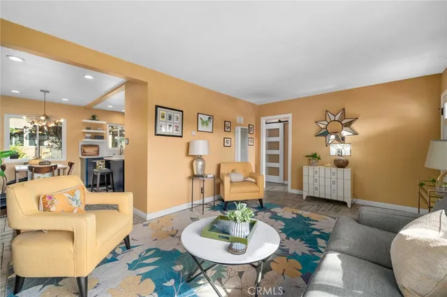 a living room with furniture and a table