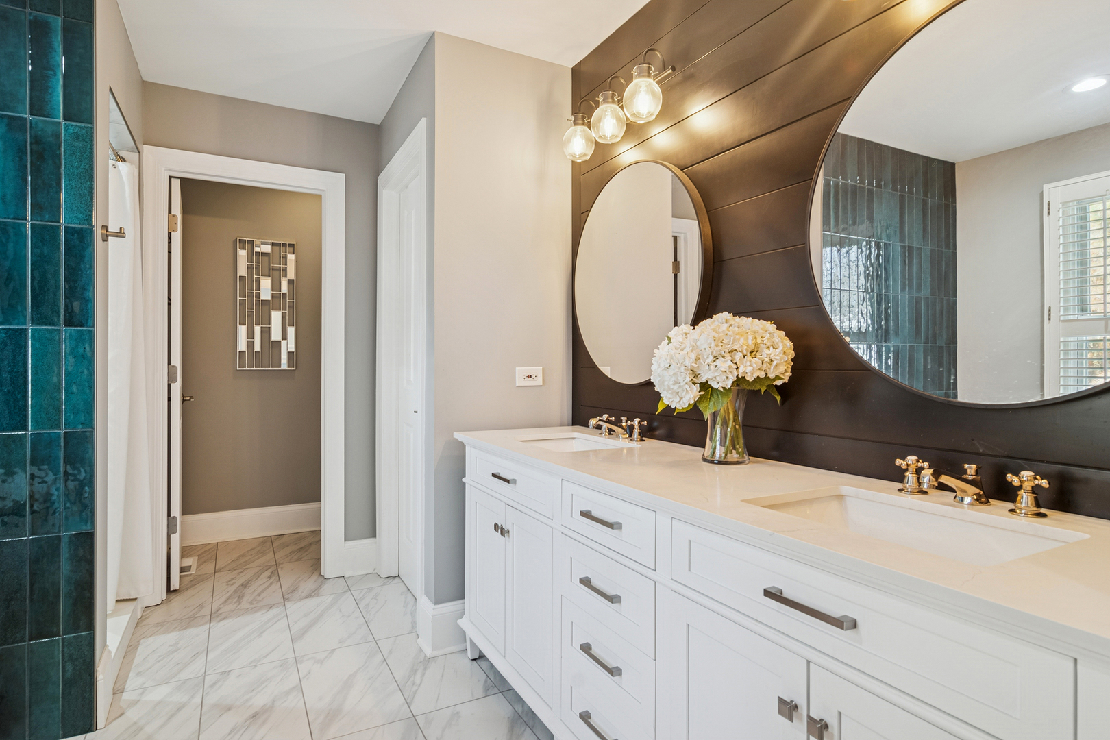 320 Washington Street Barrington, IL 60010 - Photo 15 of 34 a bathroom with a double vanity sink and a mirror