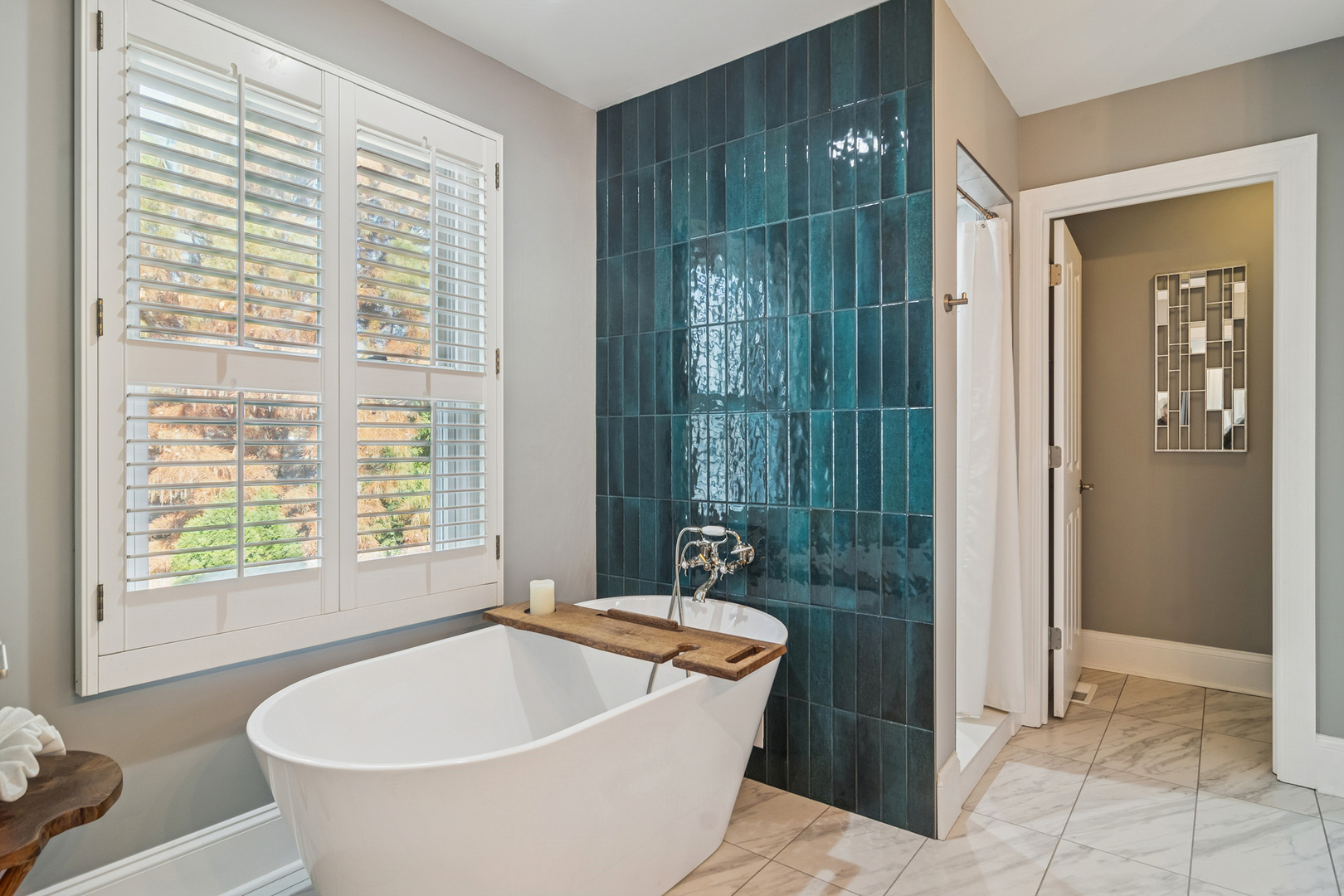 320 Washington Street Barrington, IL 60010 - Photo 16 of 34 a bath tub sitting in a bathroom next to a window