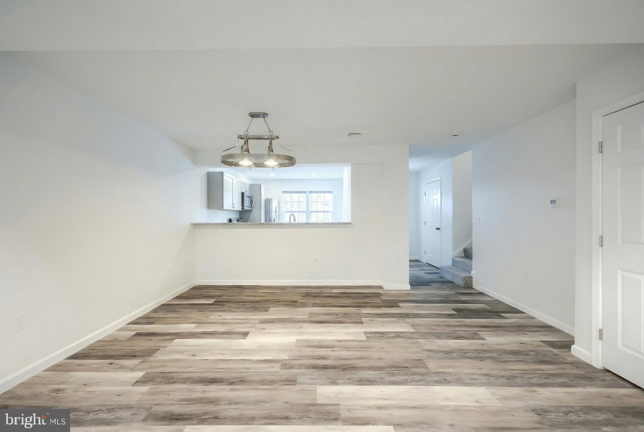 1885 Stoverstown Road, Unit 9 Spring Grove, PA 17362 - Photo 10 of 29 Spacious, modern living area with natural light.