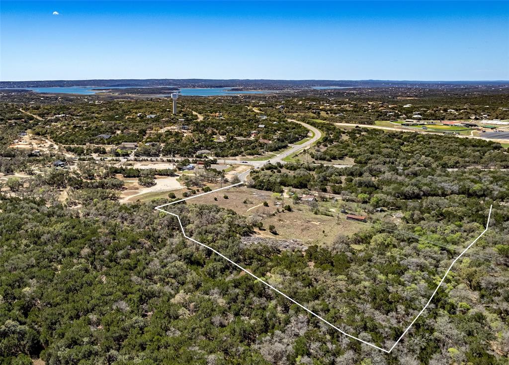  13.48 unrestricted Hill Country acres, located only 3.8 miles from Canyon Lake Marina and less than one mile from Canyon Lake High School and Ledgestone RV Resort. 