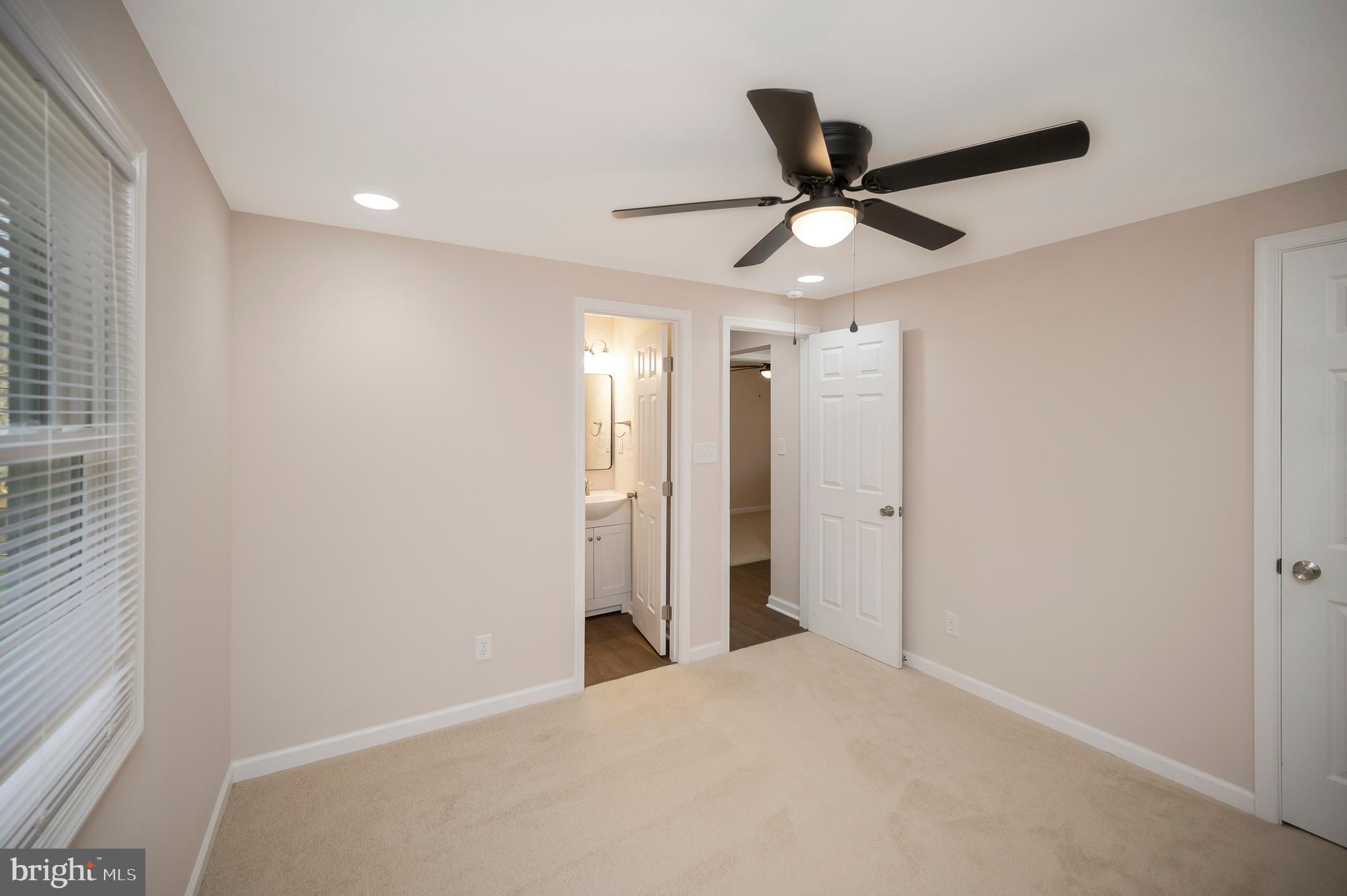 5200 Hams Ford Road Woodford, VA 22580 - Photo 21 of 51 a view of a livingroom with a ceiling fan and window