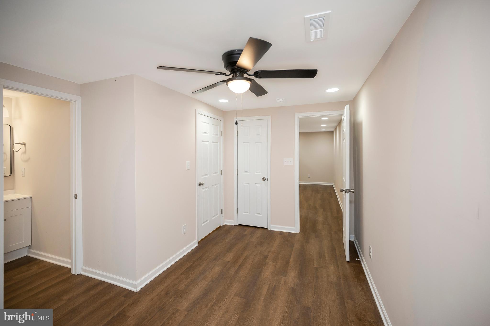 5200 Hams Ford Road Woodford, VA 22580 - Photo 38 of 51 a view of empty room with wooden floor
