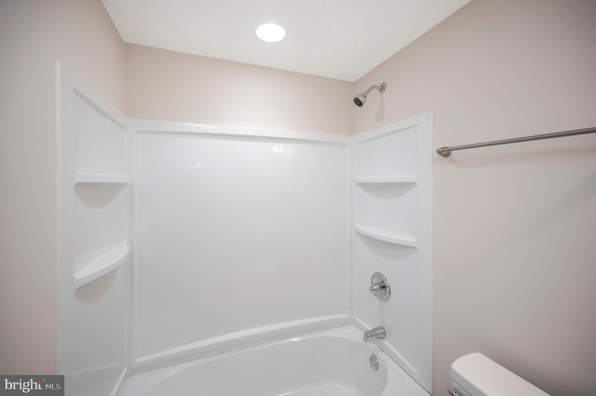 5200 Hams Ford Road Woodford, VA 22580 - Photo 40 of 51 a bathroom with a shower and toilet