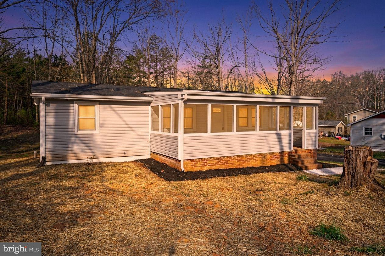 5200 Hams Ford Road Woodford, VA 22580 - Photo 4 of 51 a view of a house with a yard