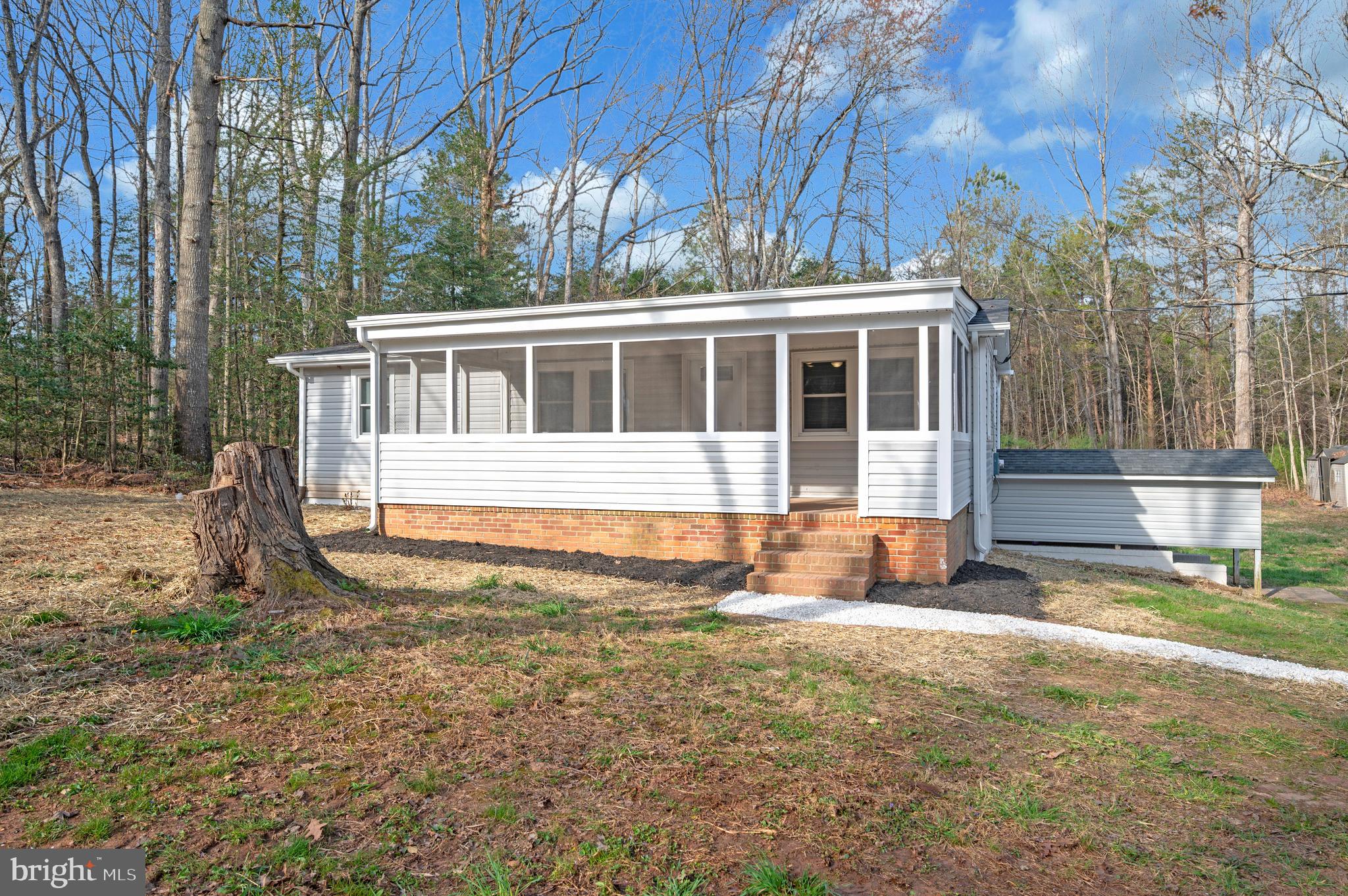 5200 Hams Ford Road Woodford, VA 22580 - Photo 45 of 51 a front view of a house with a yard