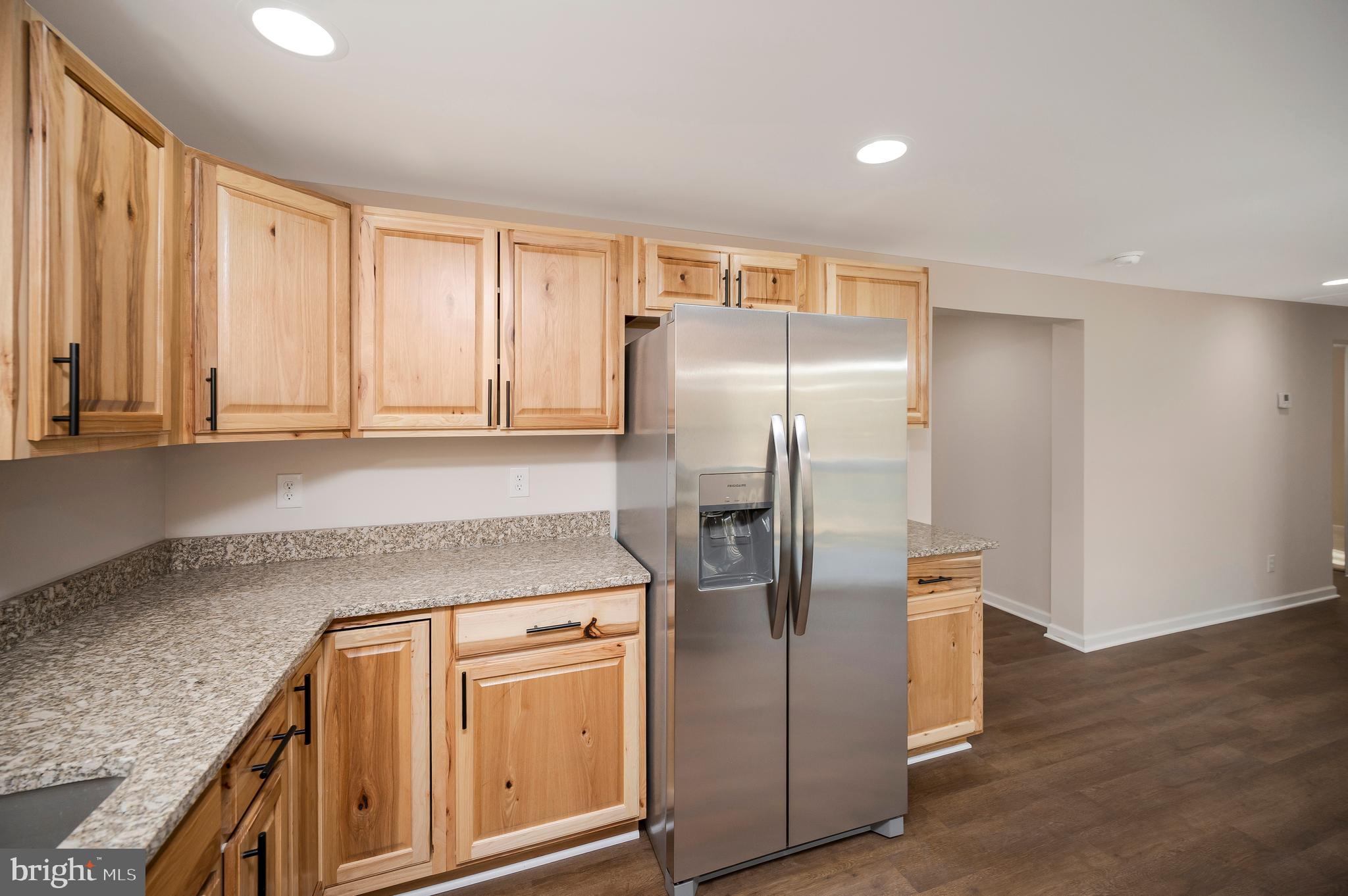 5200 Hams Ford Road Woodford, VA 22580 - Photo 9 of 51 a kitchen with stainless steel appliances granite countertop a refrigerator and a stove