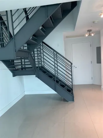 a view of a balcony with city view