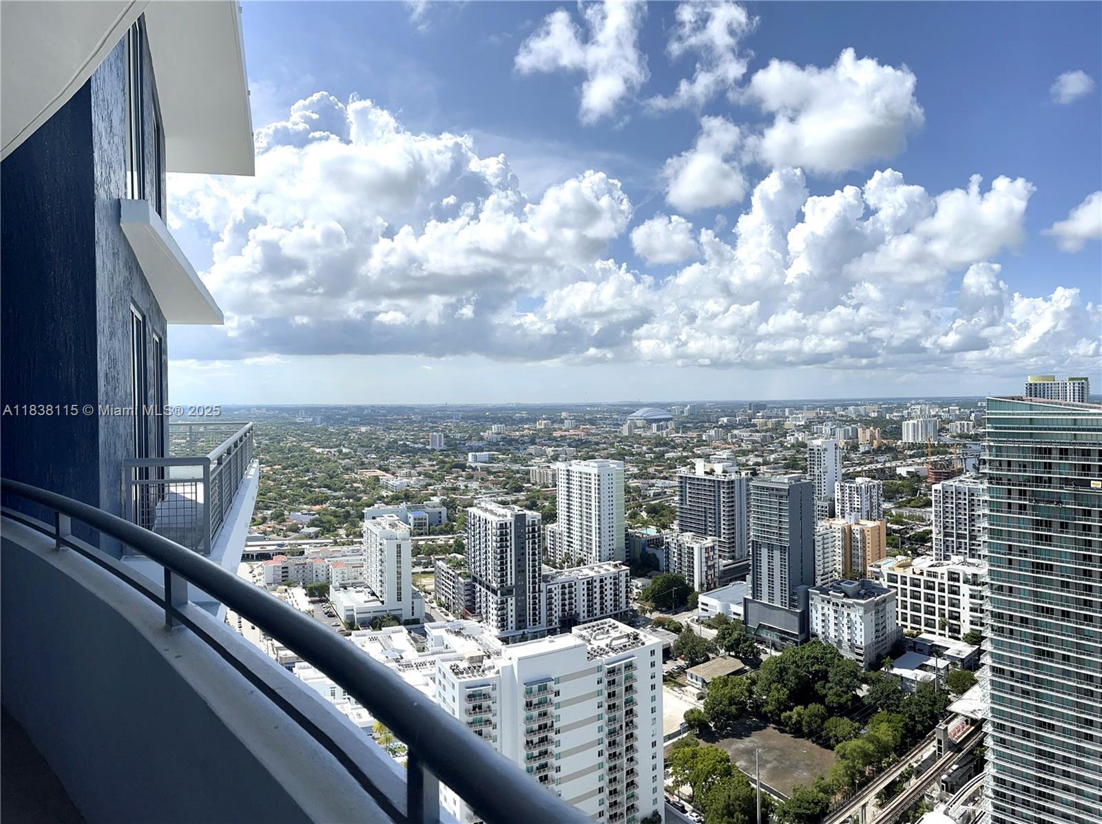 60 Southwest 13th Street, Unit 3826 Miami, FL 33130 - Photo 14 of 29 a view of a city from a balcony