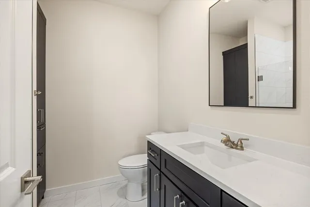 a view of a house with backyard porch and sitting area