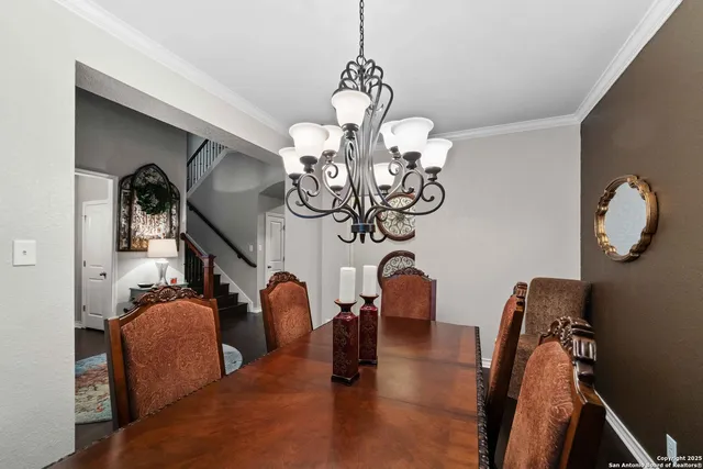 a view of a livingroom with furniture and a chandelier