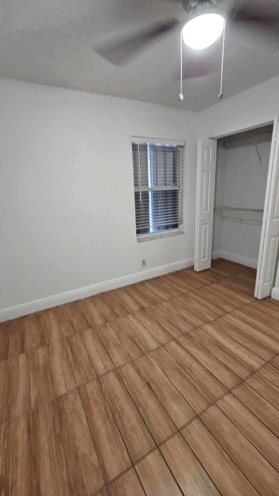 3391 Avenue South Riviera Beach, FL 33404 - Photo 10 of 16 a view of an empty room with a window