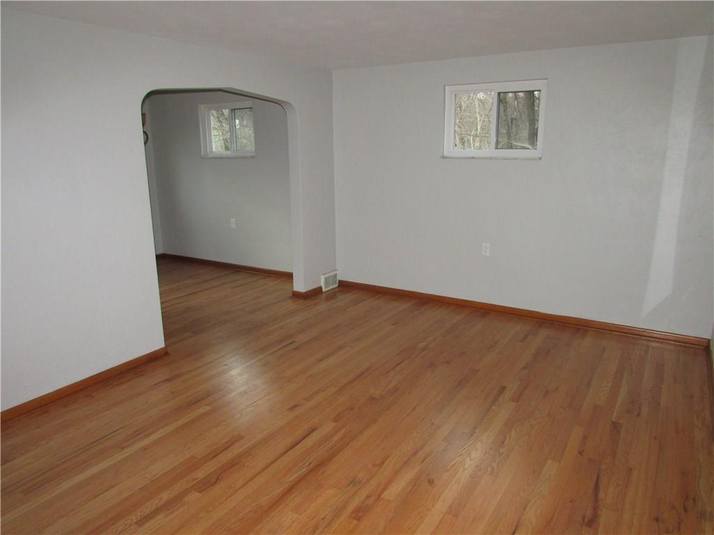 Living Room with refinished hardwood floors on 1st floor