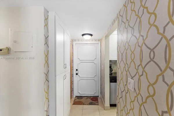 a bathroom with a shower and a mirror