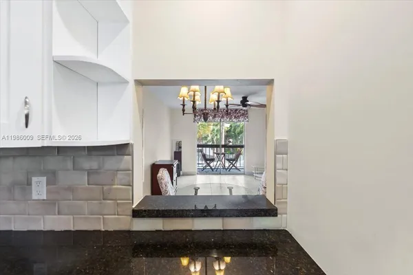 a bathroom with a sink and a window