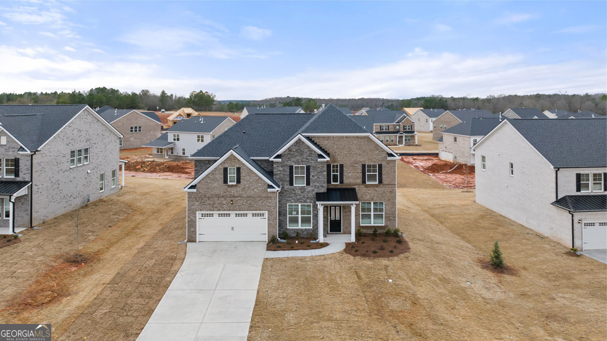 1743 Goodwin Drive Hampton, GA 30228 - Photo 7 of 56 an aerial view of a house with a yard
