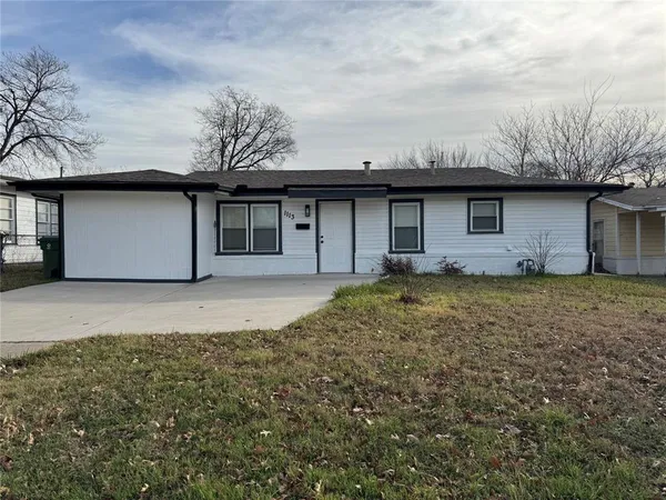 a house view with a backyard space