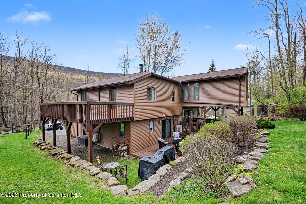 719 Scott Road Clarks Summit, PA 18411 - Photo 45 of 51 a view of house with a yard and patio